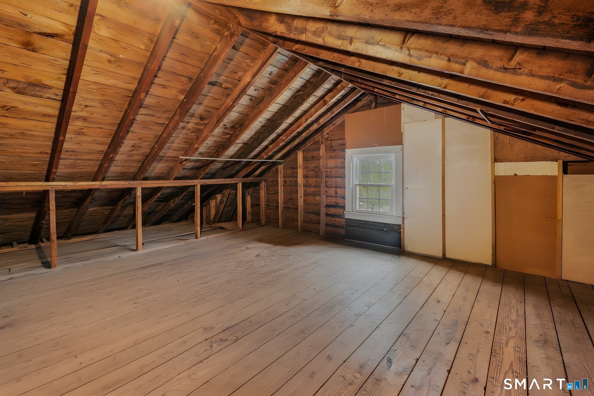 414 Main Street Sprague, CT 06330 - Photo 19 of 34 a view of an empty room with wooden floor