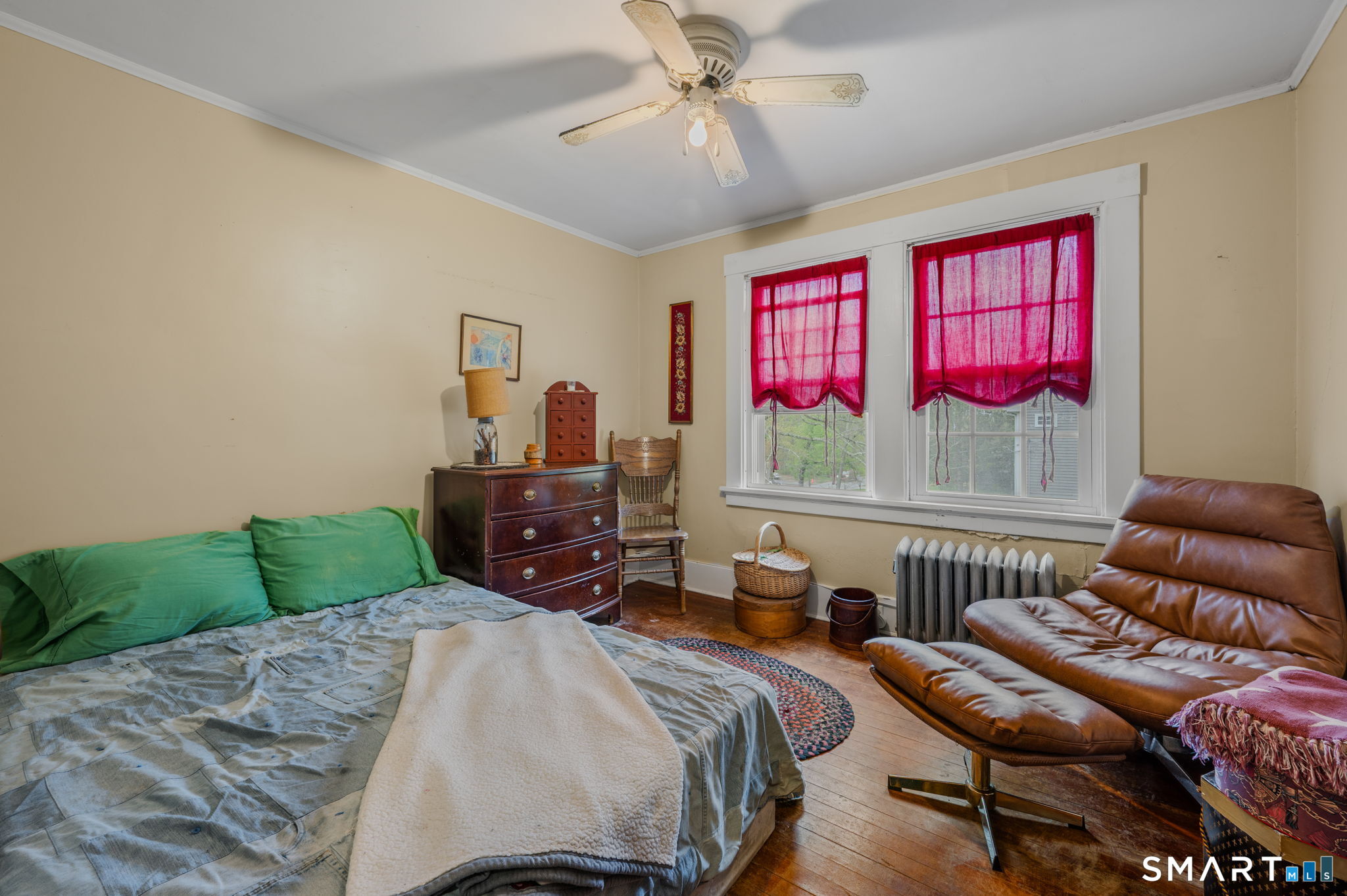 414 Main Street Sprague, CT 06330 - Photo 21 of 34 a bedroom with a bed and furniture