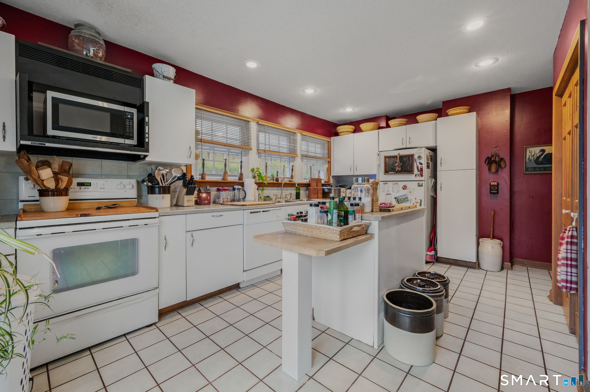 414 Main Street Sprague, CT 06330 - Photo 26 of 34 a kitchen with a sink appliances and cabinets