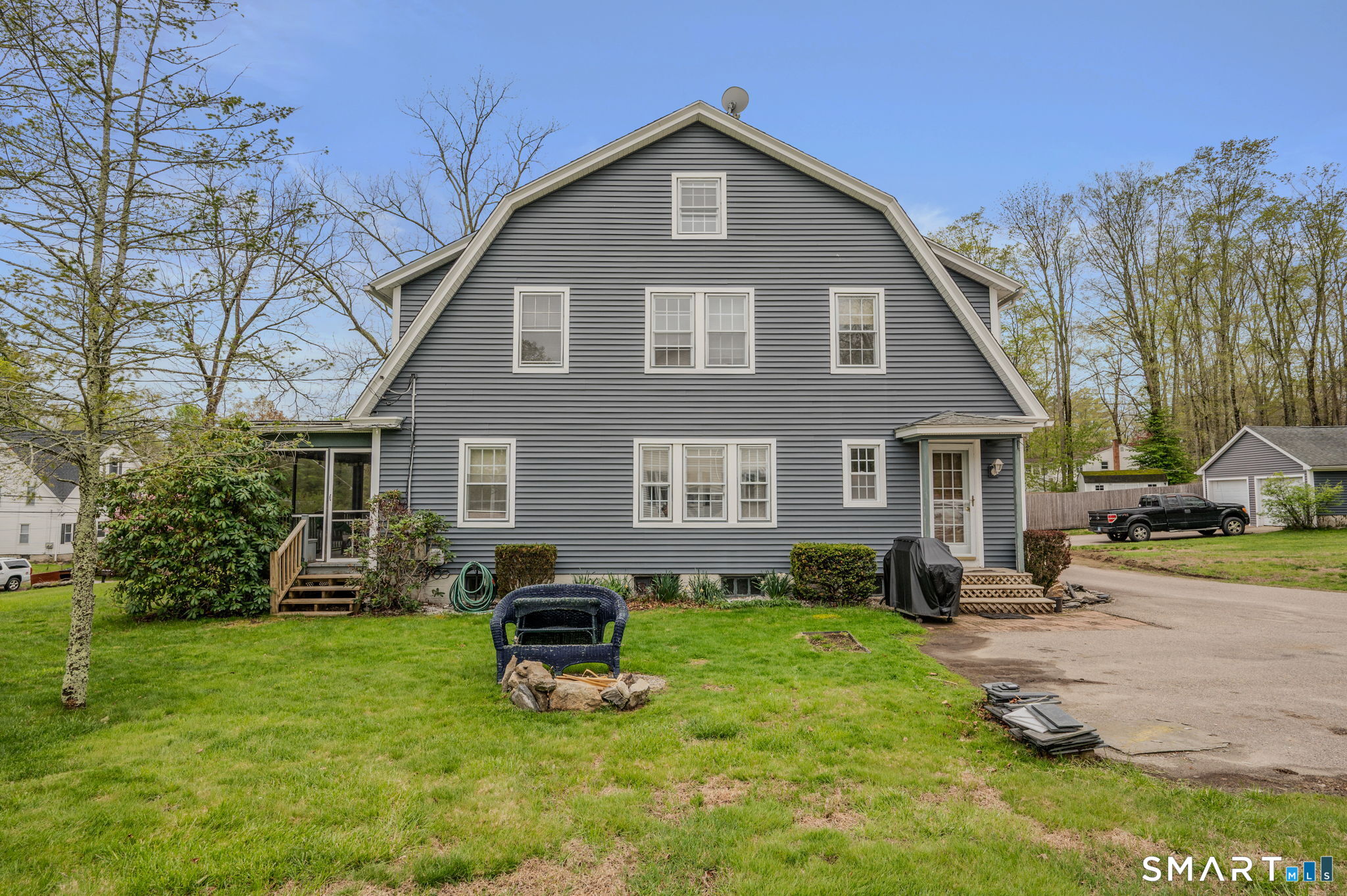 414 Main Street Sprague, CT 06330 - Photo 5 of 34 a front view of a house with garden
