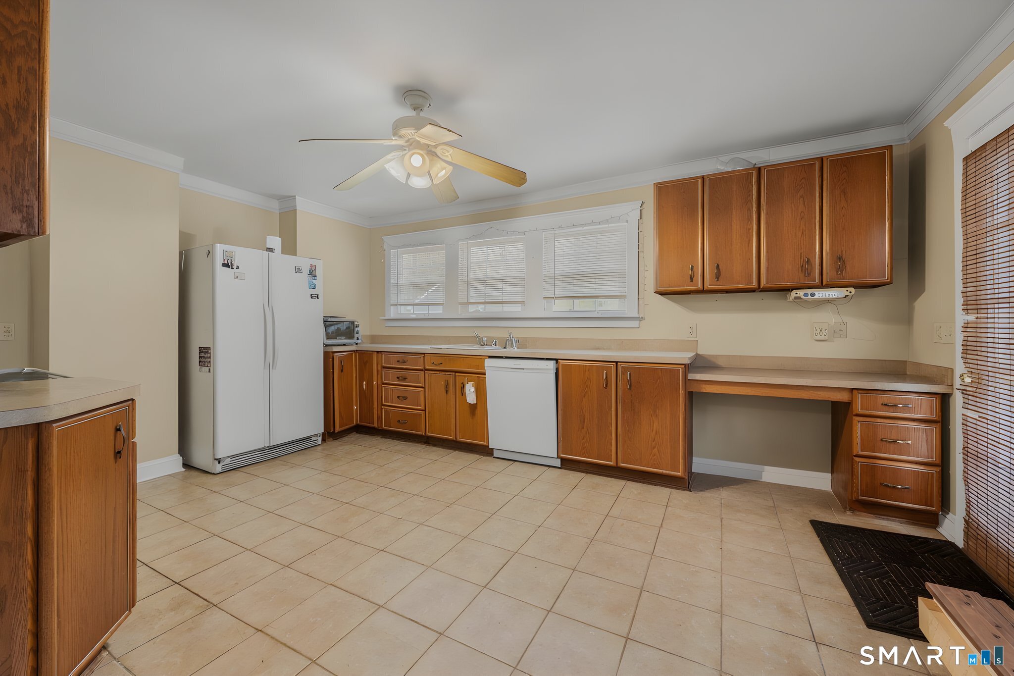 414 Main Street Sprague, CT 06330 - Photo 8 of 34 a kitchen with stainless steel appliances granite countertop a stove a sink and a refrigerator