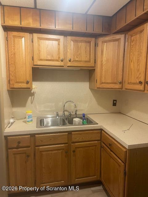147 2nd Street Old Forge, PA 18518 - Photo 6 of 13 a kitchen with sink and cabinets