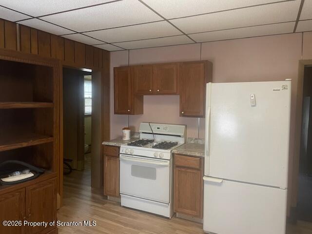 147 2nd Street Old Forge, PA 18518 - Photo 7 of 13 a white refrigerator freezer sitting inside of a kitchen