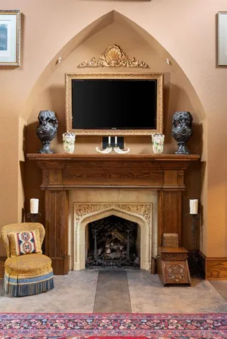 a kitchen with a stove and cabinets