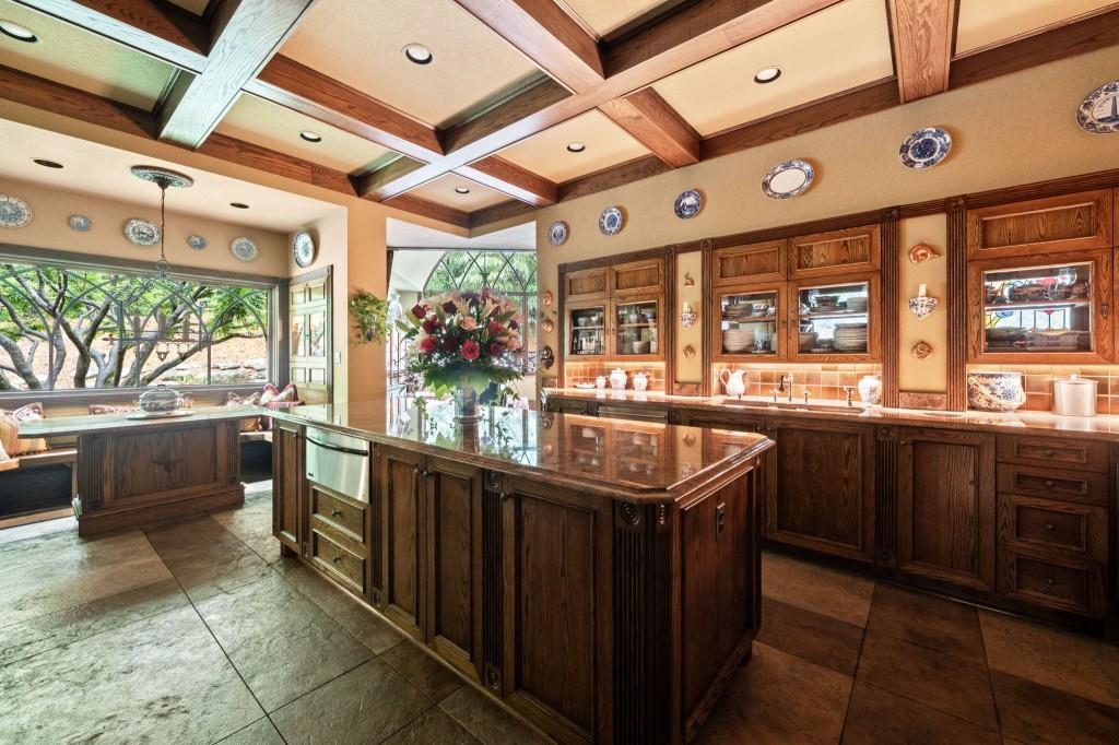 114 Lees Lake Road Fayetteville, GA 30214 - Photo 21 of 69 a kitchen with stainless steel appliances granite countertop a sink and wooden cabinets
