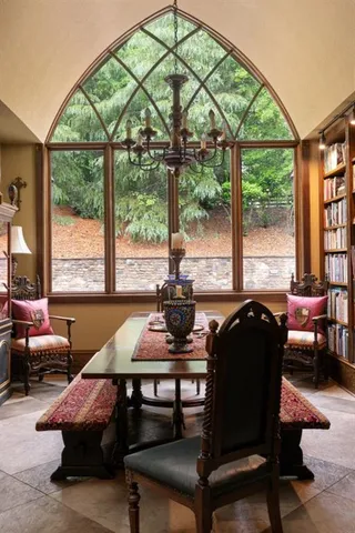 a view of swimming pool with seating area