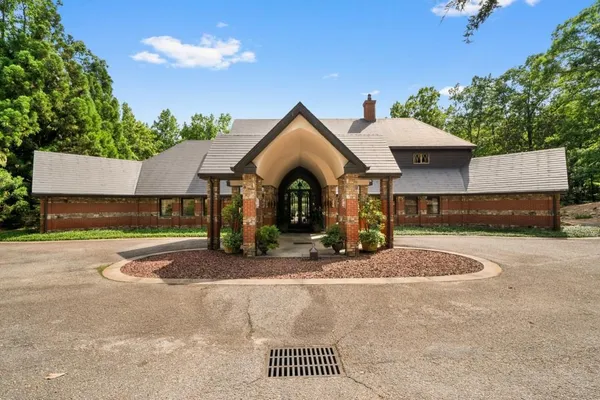 a view of a house with a roof deck