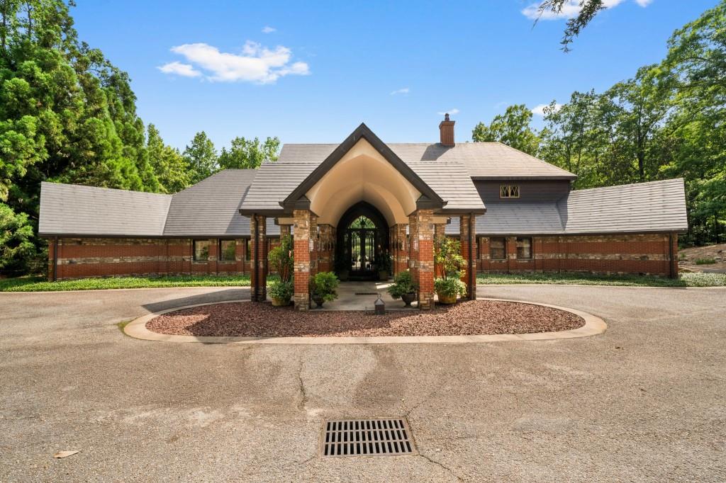 114 Lees Lake Road Fayetteville, GA 30214 - Photo 3 of 69 a front view of a house with a yard and garage