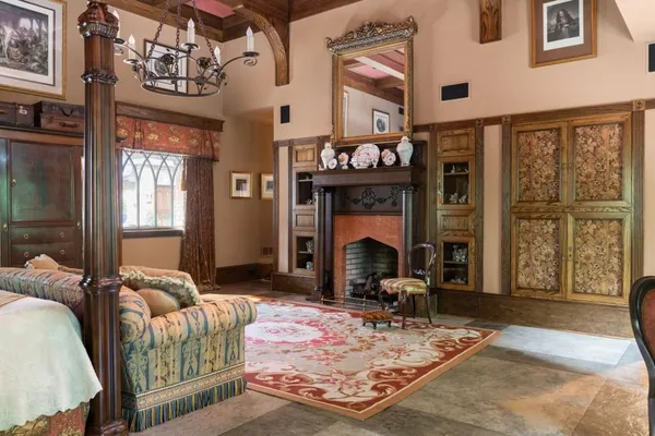 a bathroom with a granite countertop sink a toilet and bathtub