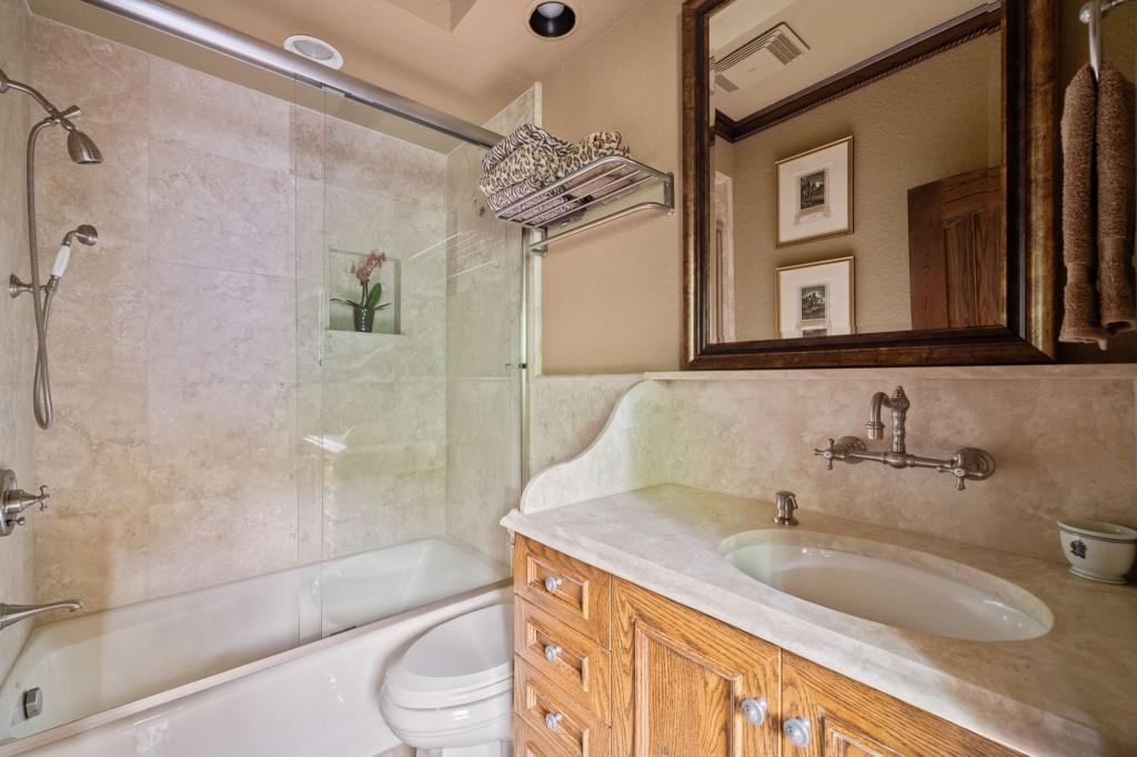 114 Lees Lake Road Fayetteville, GA 30214 - Photo 44 of 69 a bathroom with a granite countertop sink a toilet and shower