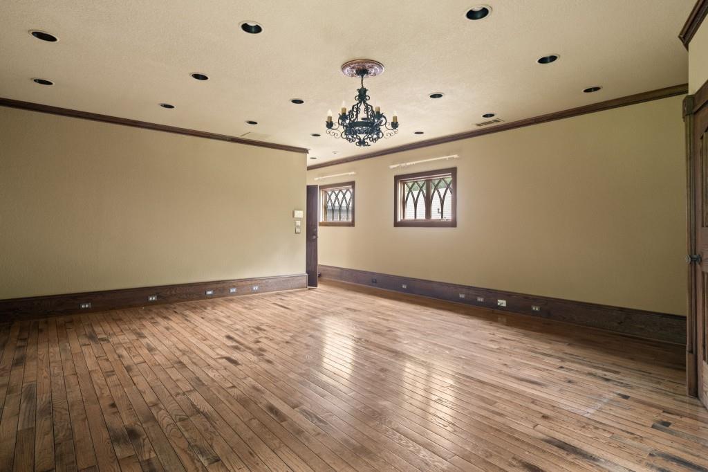 114 Lees Lake Road Fayetteville, GA 30214 - Photo 48 of 69 a view of an empty room with window and wooden floor