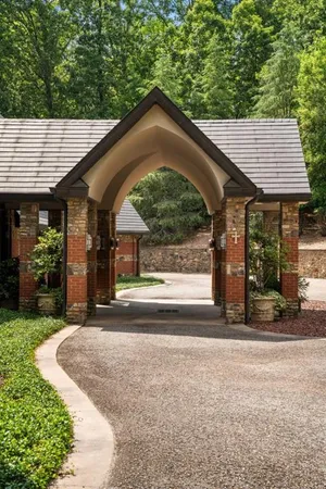 a front view of a residential apartment building with entryway
