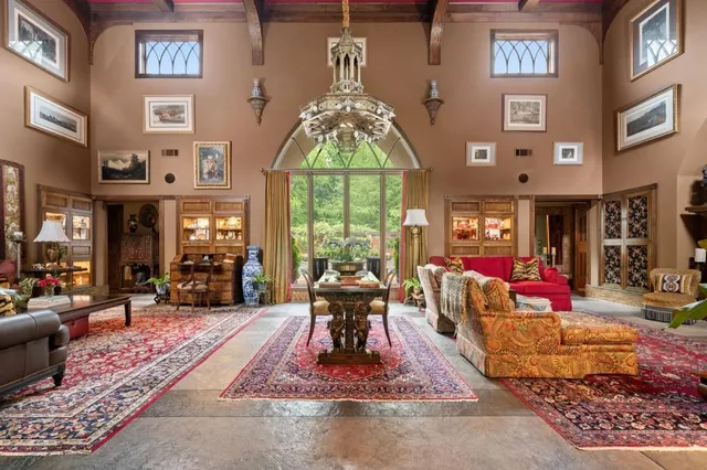a kitchen with stainless steel appliances granite countertop a sink and wooden cabinets