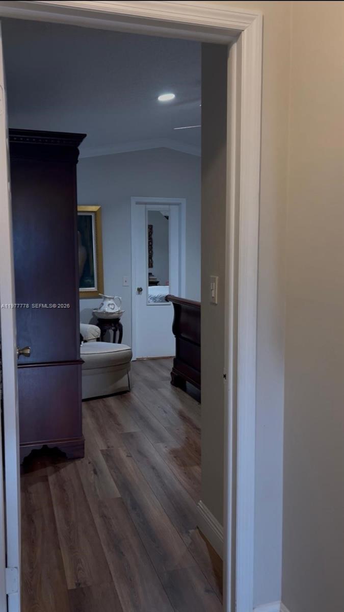 4911 Southwest 142nd Place Miami, FL 33175 - Photo 27 of 34 a living room with furniture and a wooden floor