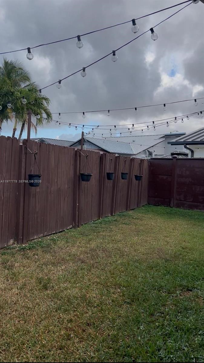 4911 Southwest 142nd Place Miami, FL 33175 - Photo 32 of 34 a view of a backyard