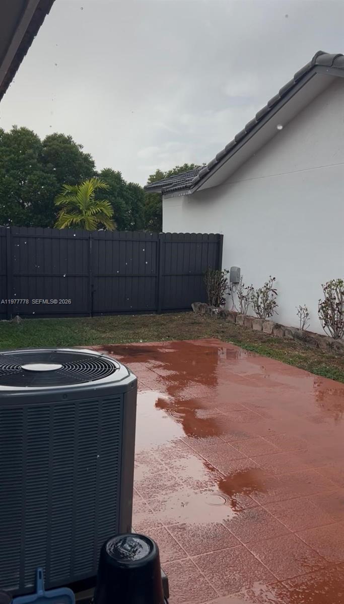 4911 Southwest 142nd Place Miami, FL 33175 - Photo 33 of 34 a view of a backyard of the house