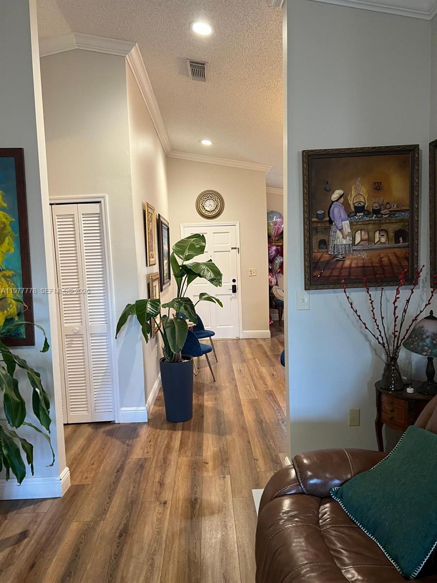 4911 Southwest 142nd Place Miami, FL 33175 - Photo 9 of 34 a view of a living room and dining room