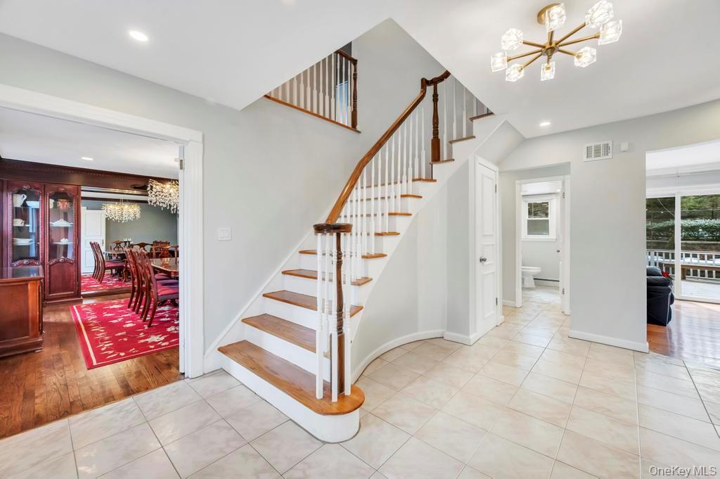 10 Hunting Hill Road Woodbury, NY 11797 - Photo 13 of 39 a view of entryway and hall