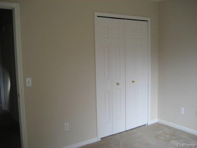 8083 Huntington Ridge Court, Unit 18 Washington, MI 48094 - Photo 20 of 25 Front_Bdrm_Closet.jpg