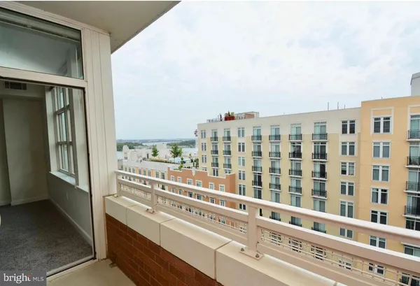 a view of a building with a yard