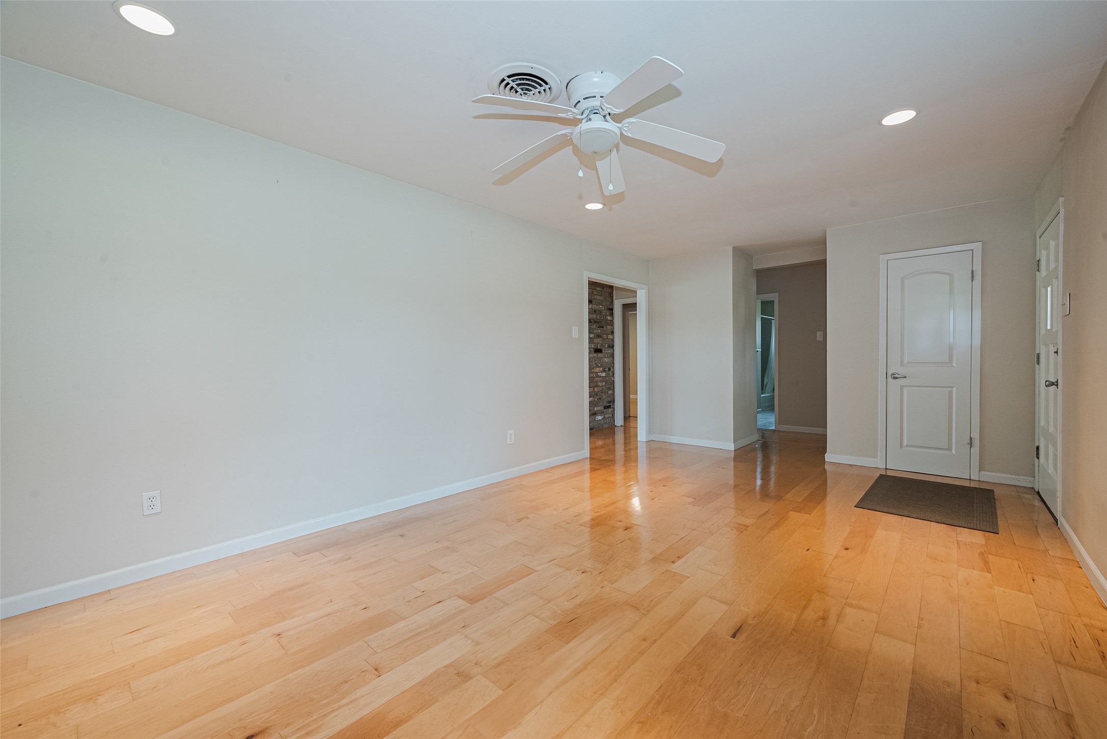 4834 Sanford Road Houston, TX 77035 - Photo 11 of 46 wooden floor in an empty room with a window