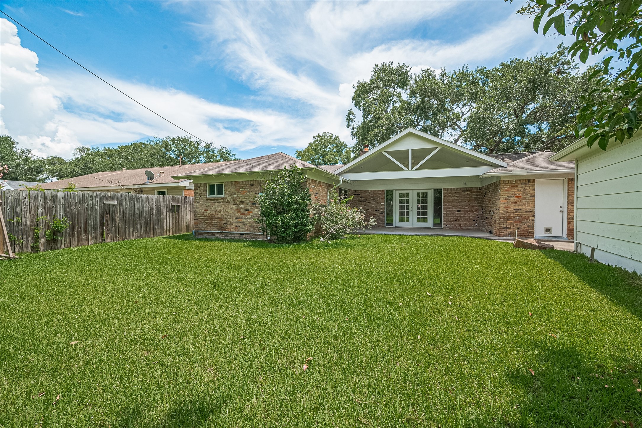 4834 Sanford Road Houston, TX 77035 - Photo 12 of 46 a front view of a house with garden