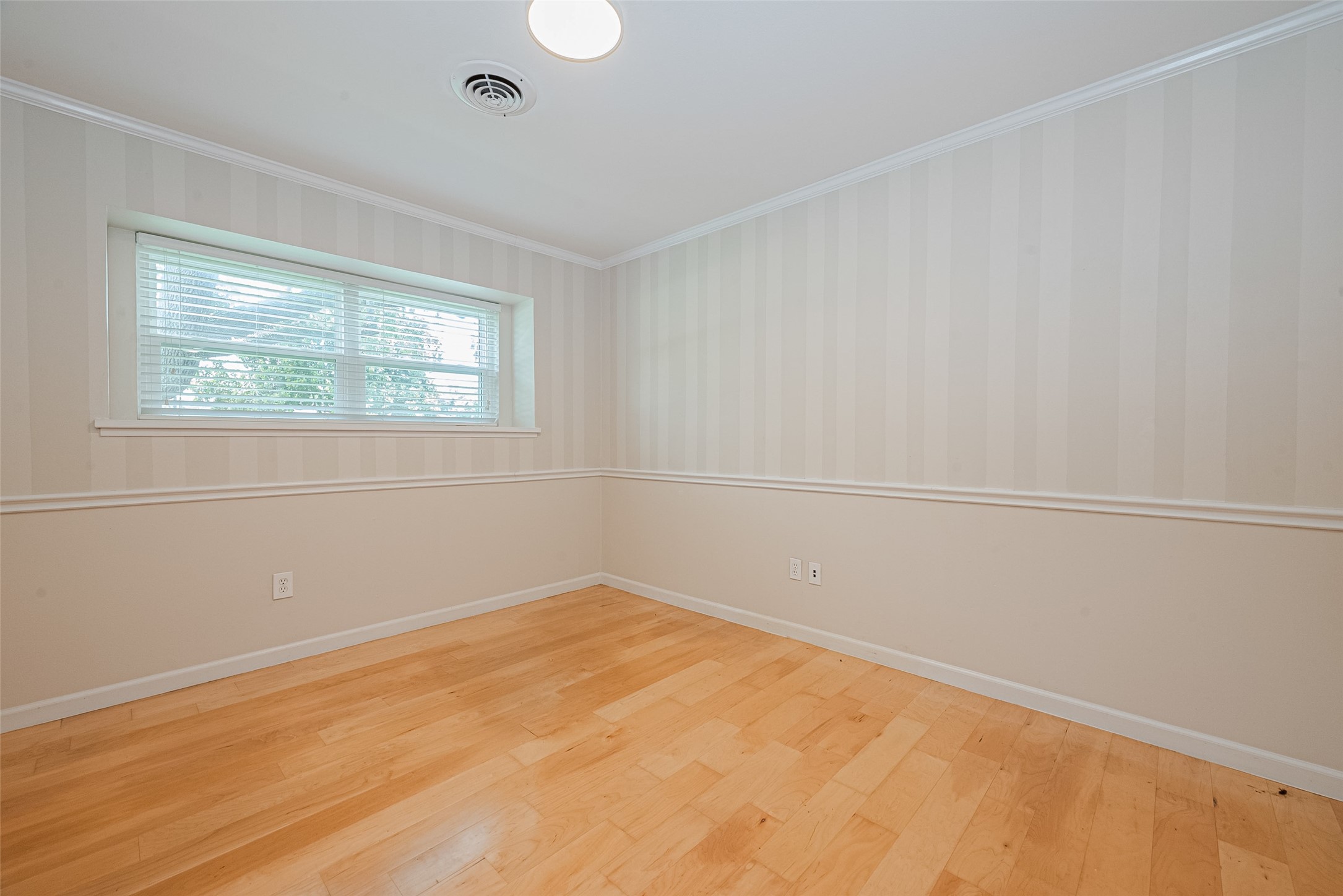 4834 Sanford Road Houston, TX 77035 - Photo 14 of 46 an empty room with a window