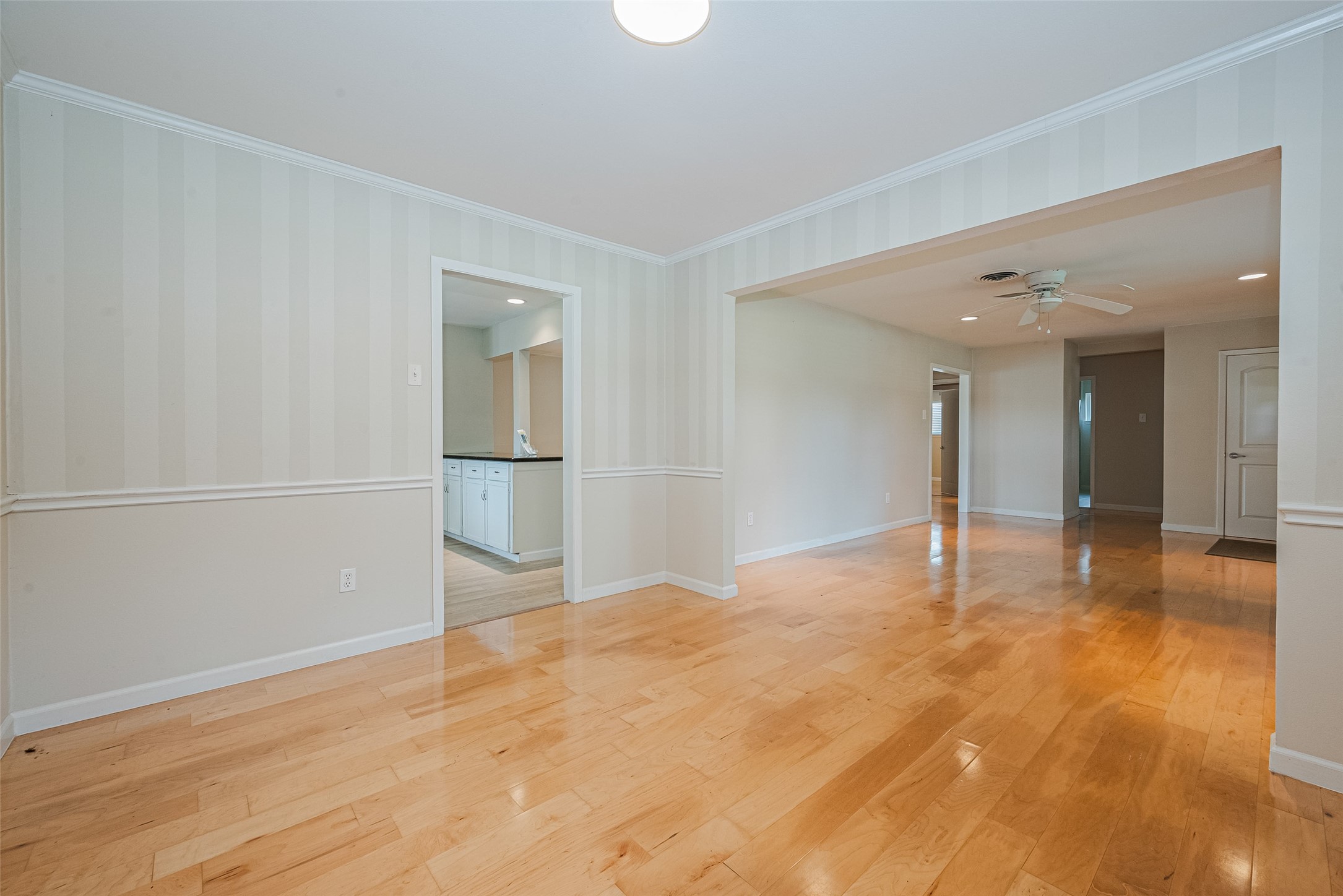 4834 Sanford Road Houston, TX 77035 - Photo 16 of 46 a view of empty room with wooden floor