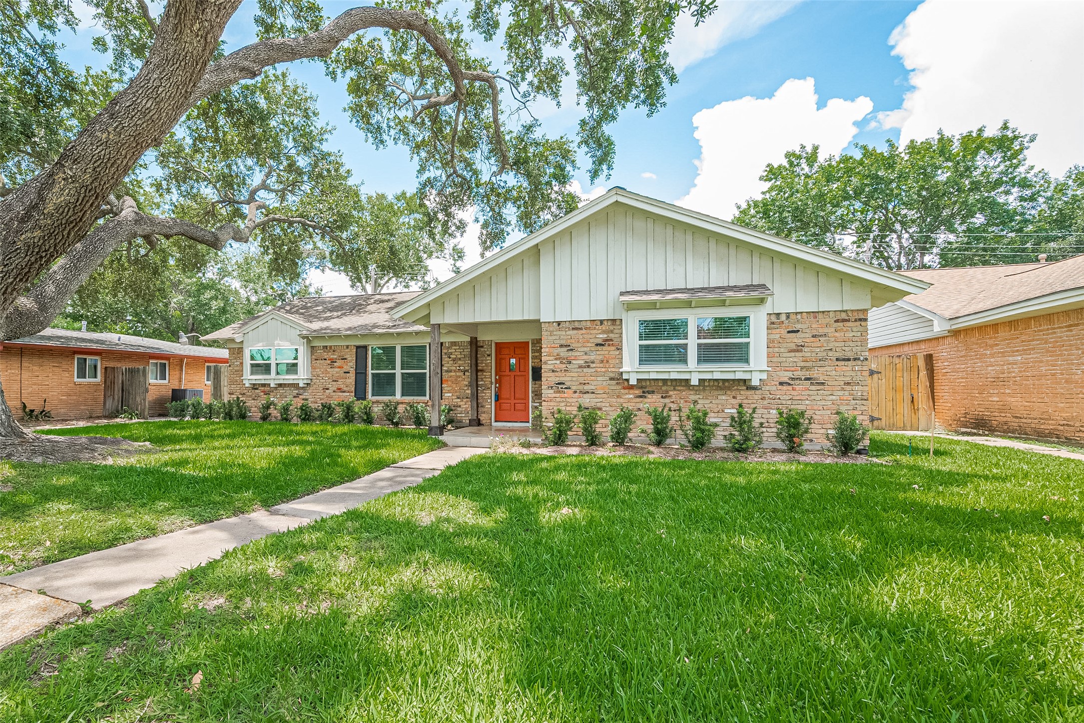 4834 Sanford Road Houston, TX 77035 - Photo 2 of 46 front view of a house and a yard