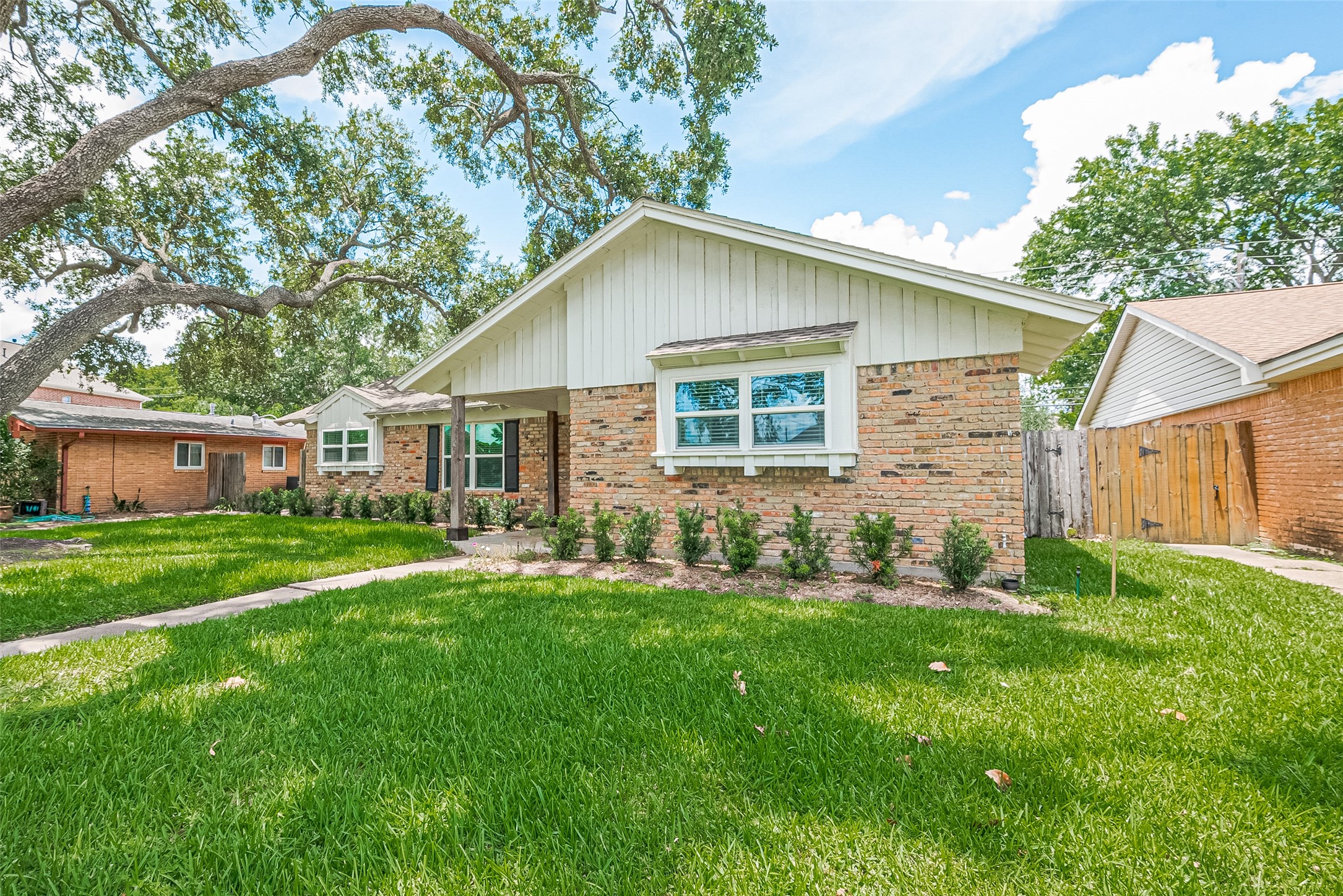4834 Sanford Road Houston, TX 77035 - Photo 3 of 46 a front view of house with yard and green space