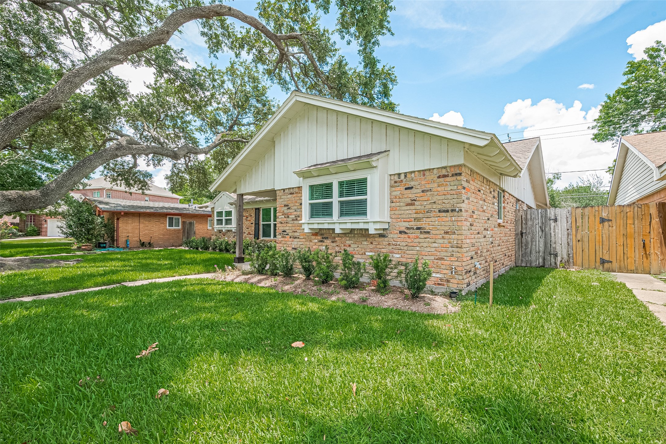 4834 Sanford Road Houston, TX 77035 - Photo 4 of 46 a view of a house with yard and tree s