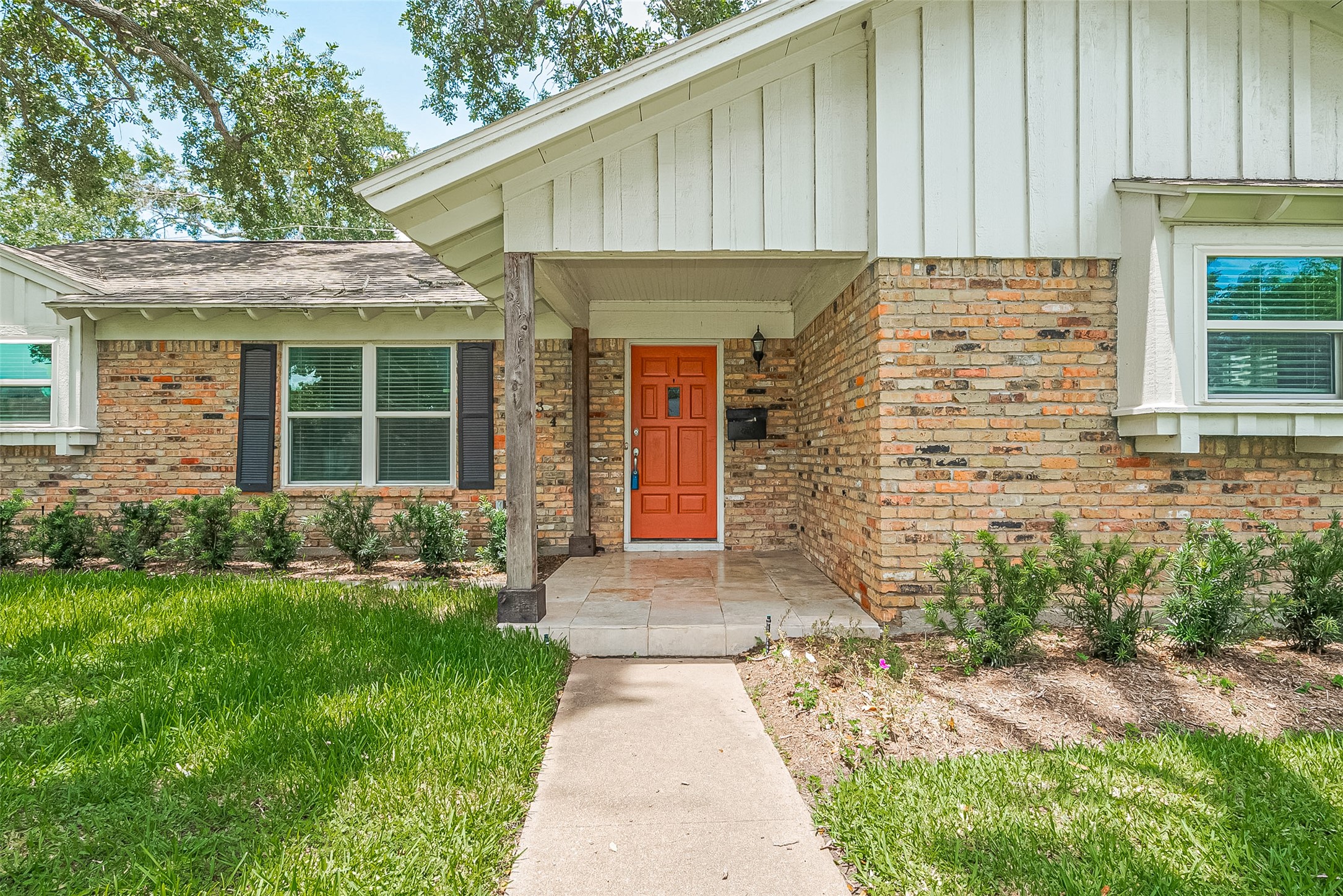 4834 Sanford Road Houston, TX 77035 - Photo 6 of 46 a front view of a house with garden
