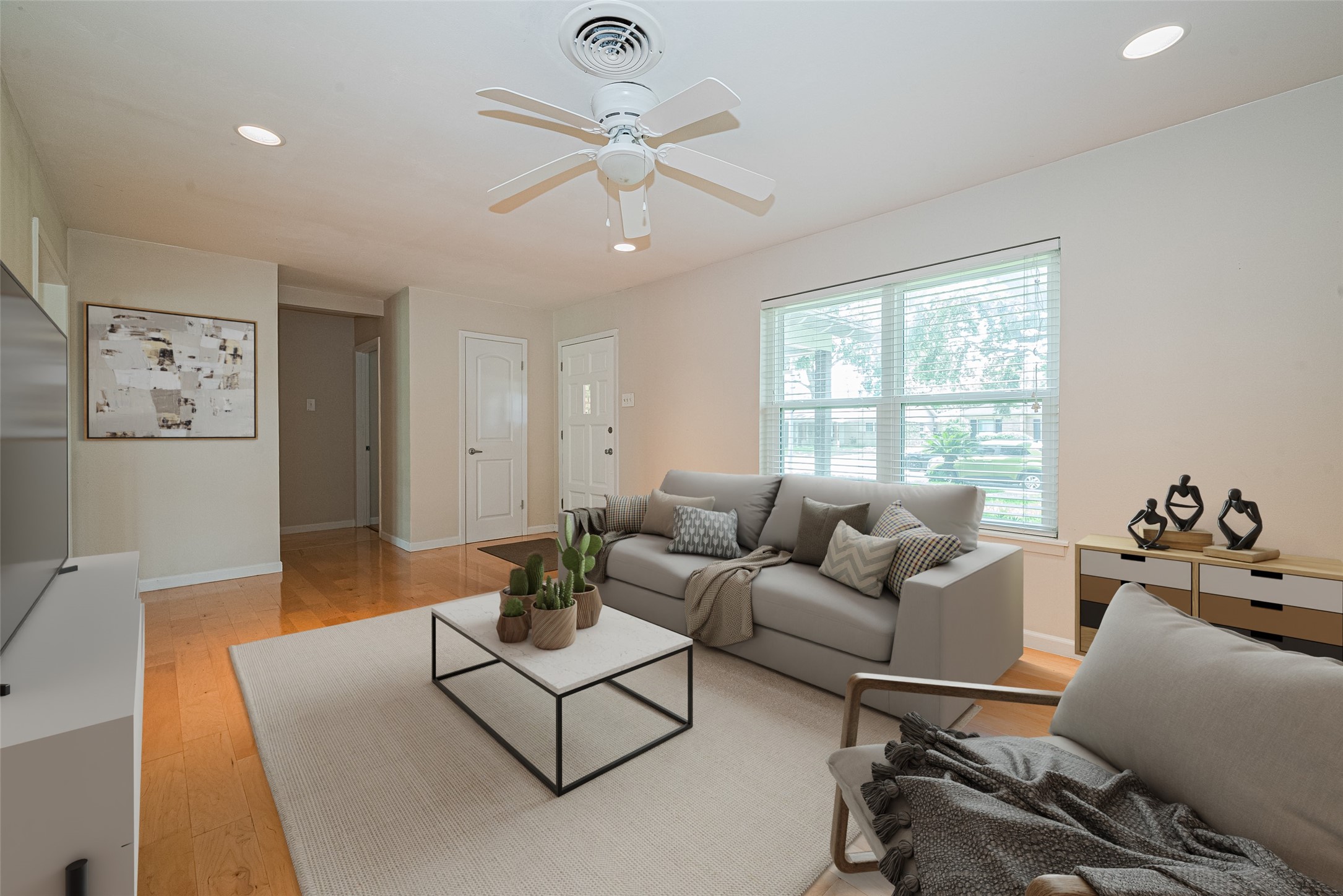 4834 Sanford Road Houston, TX 77035 - Photo 10 of 46 a living room with furniture and a large window
