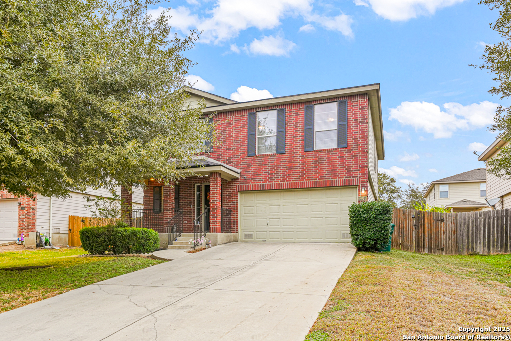 9019 Lilac Hill Universal City, TX 78148 - Photo 1 of 1 a front view of a house with garden