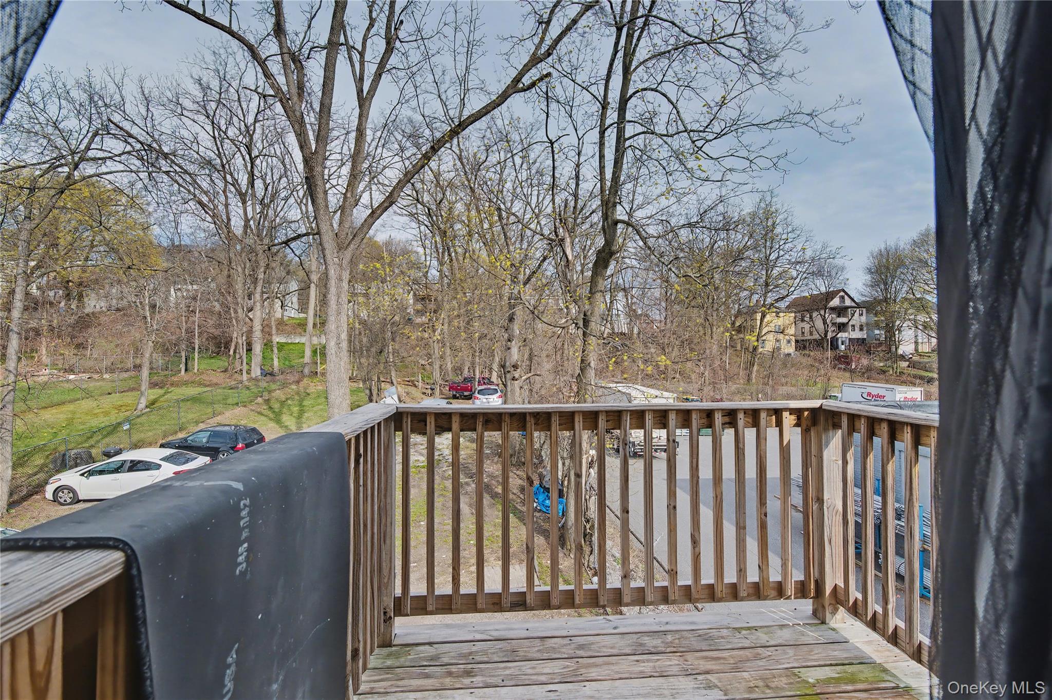 139 North Hamilton Street, Unit 2 Poughkeepsie, NY 12601 - Photo 14 of 15 a view of a roof deck with wooden fence and floor