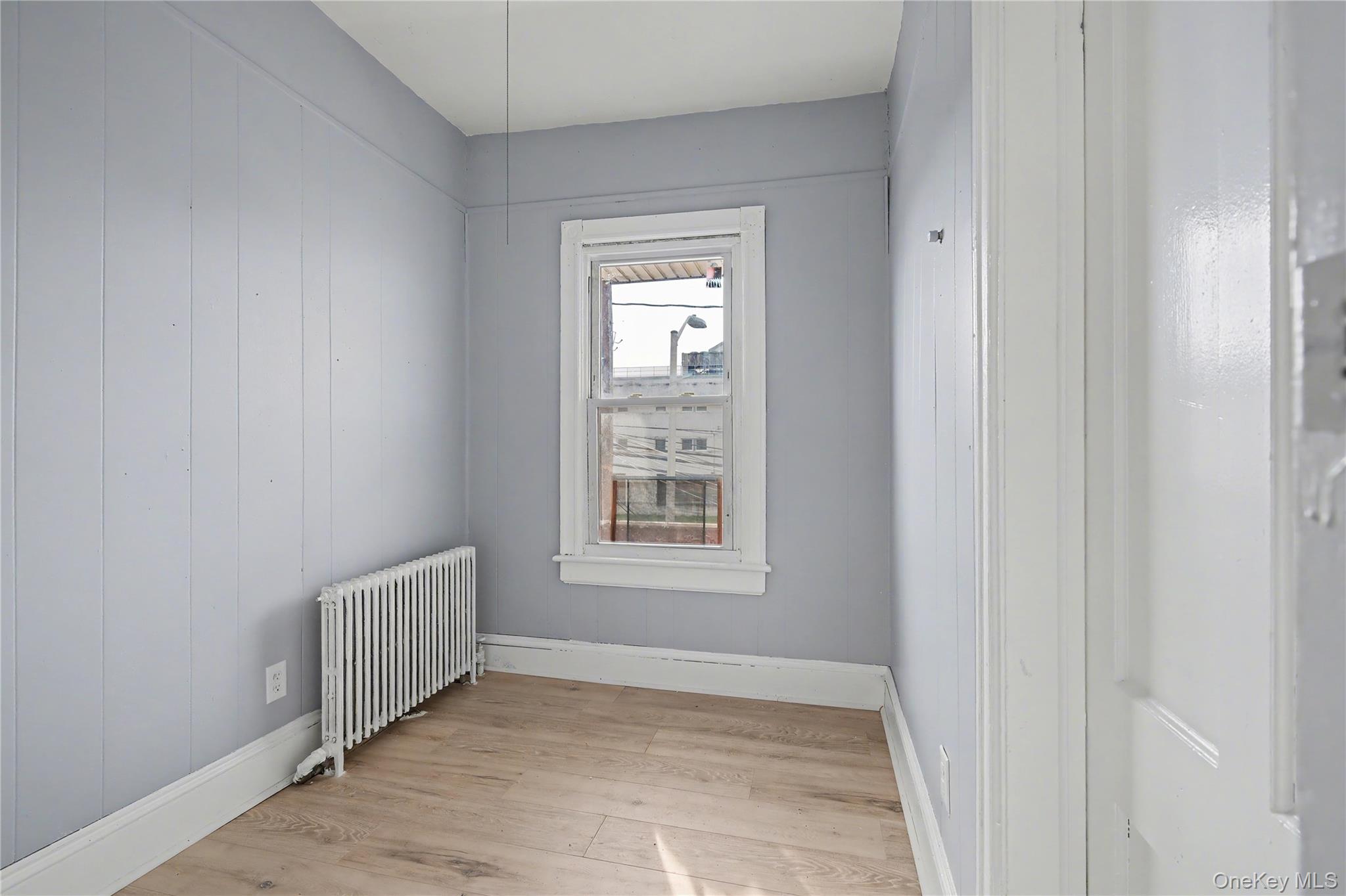 139 North Hamilton Street, Unit 2 Poughkeepsie, NY 12601 - Photo 6 of 15 a view of an empty room with a window