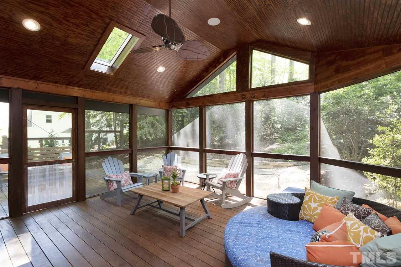 2908 Sandia Drive Raleigh, NC 27607 - Photo 12 of 29 Due to perfect SW exposure, you can plan to enjoy this huge screened in porch all year.