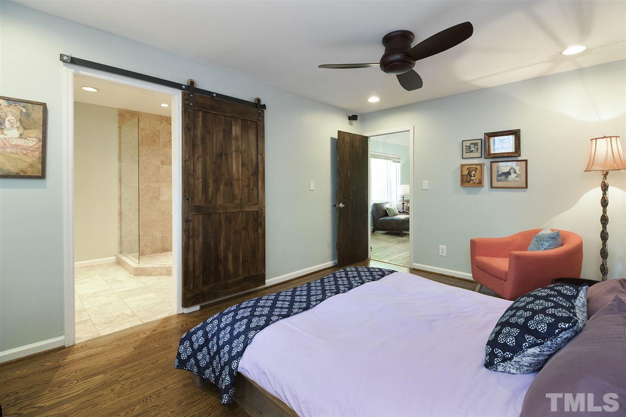 2908 Sandia Drive Raleigh, NC 27607 - Photo 13 of 29 Tasteful Master Suite with travertine bath and large walk-in closet.