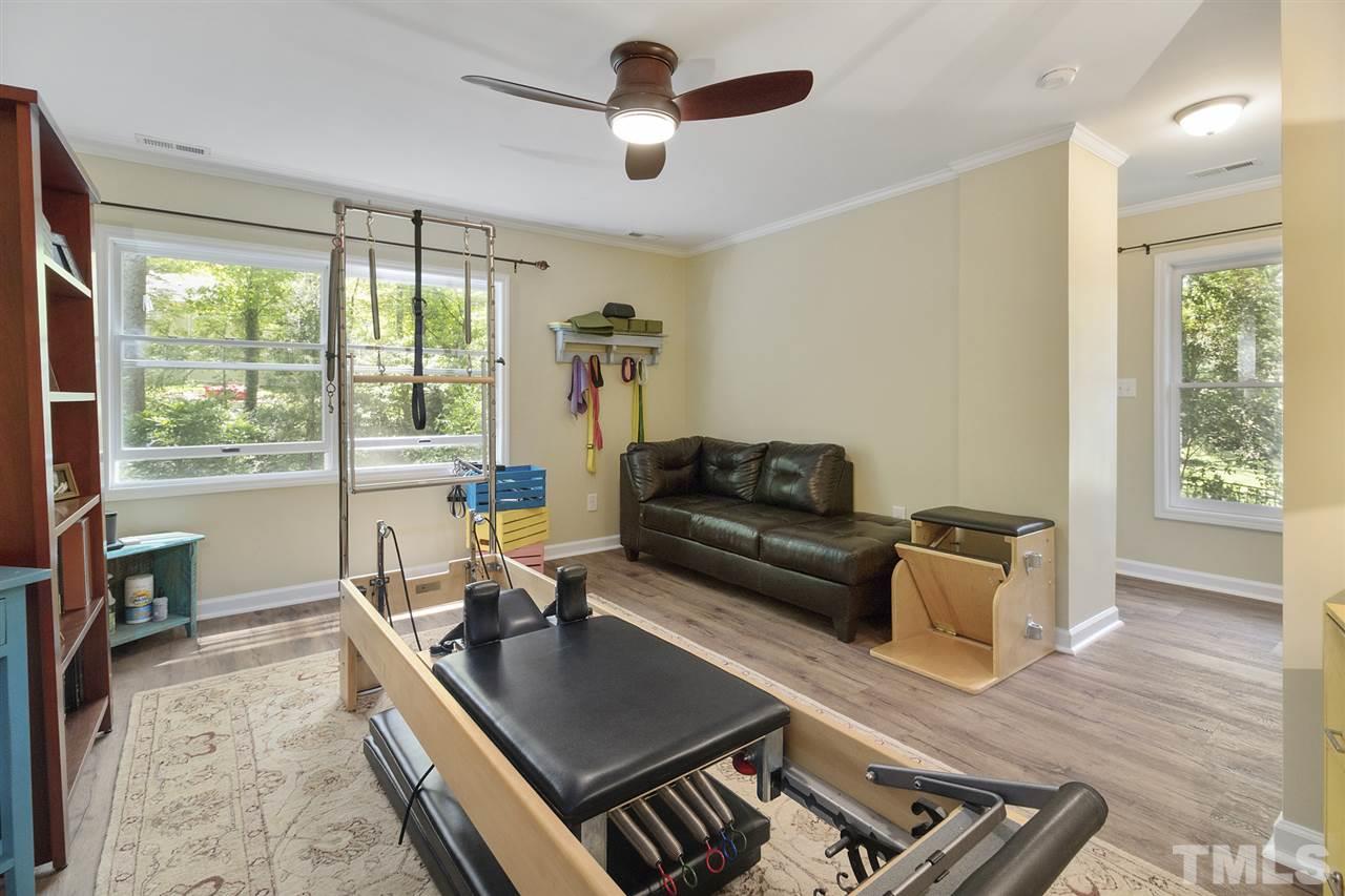 2908 Sandia Drive Raleigh, NC 27607 - Photo 21 of 29 This spacious bedroom is currently a pilates studio with attached full bath.