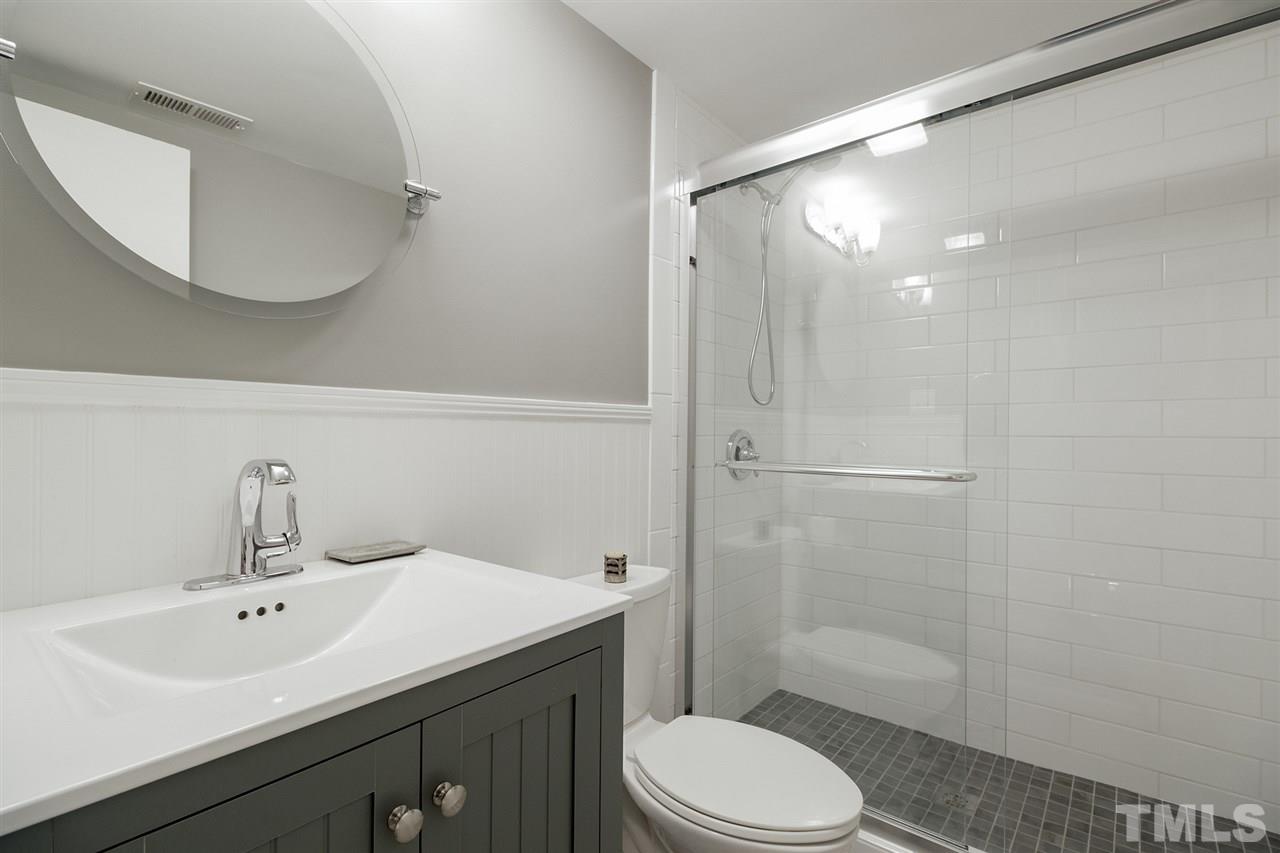 2908 Sandia Drive Raleigh, NC 27607 - Photo 22 of 29 2nd Full bath upstairs recently gutted and remodeled with modern yet timeless choices.