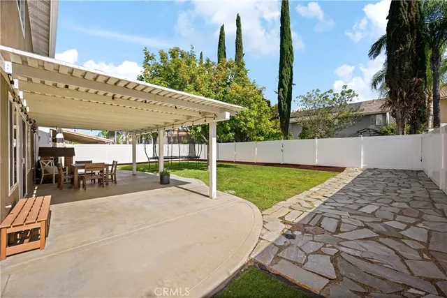 a view of a backyard with porch