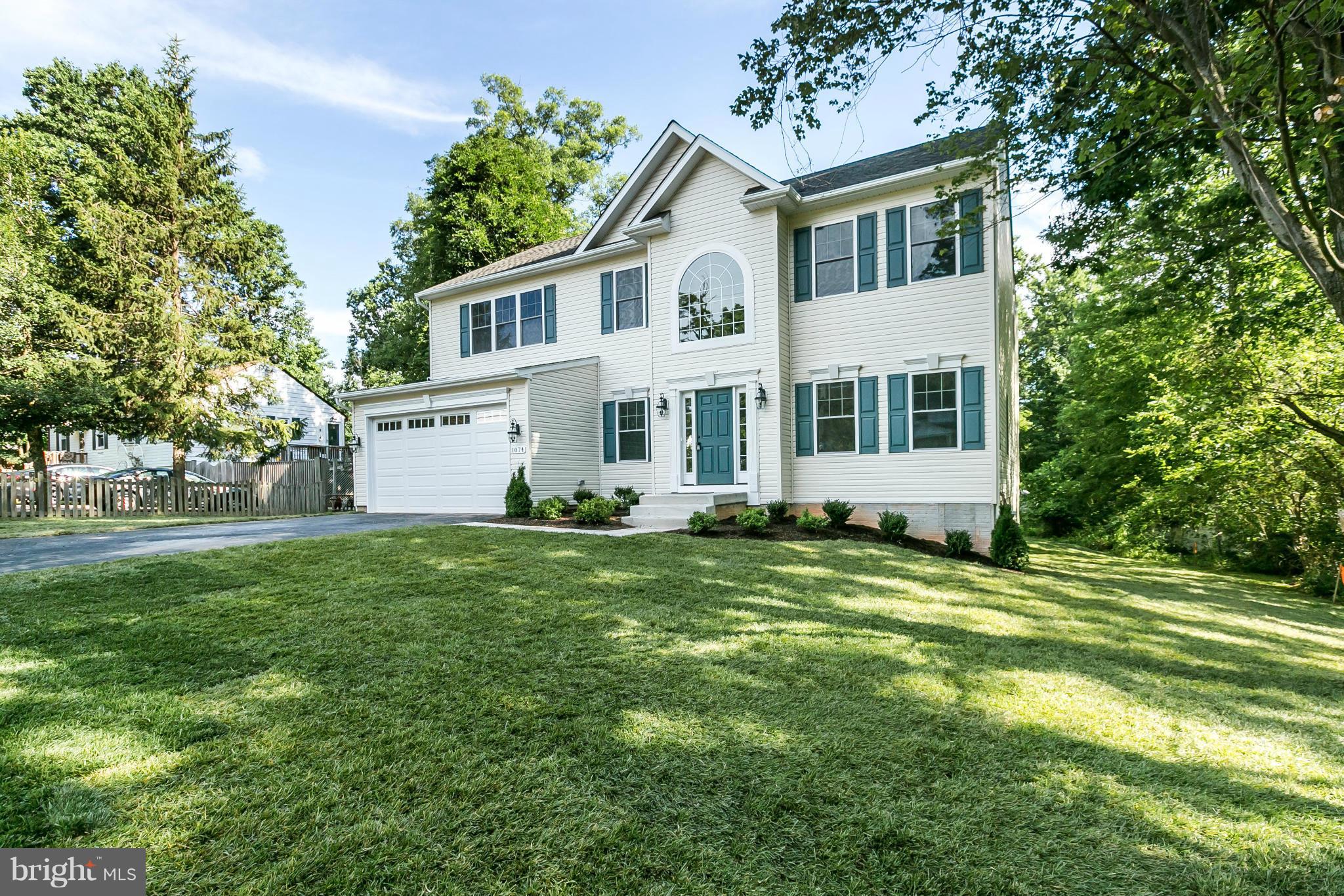 1074 Minnetonka Road Severn, MD 21144 - Photo 3 of 30 a front view of a house with a garden
