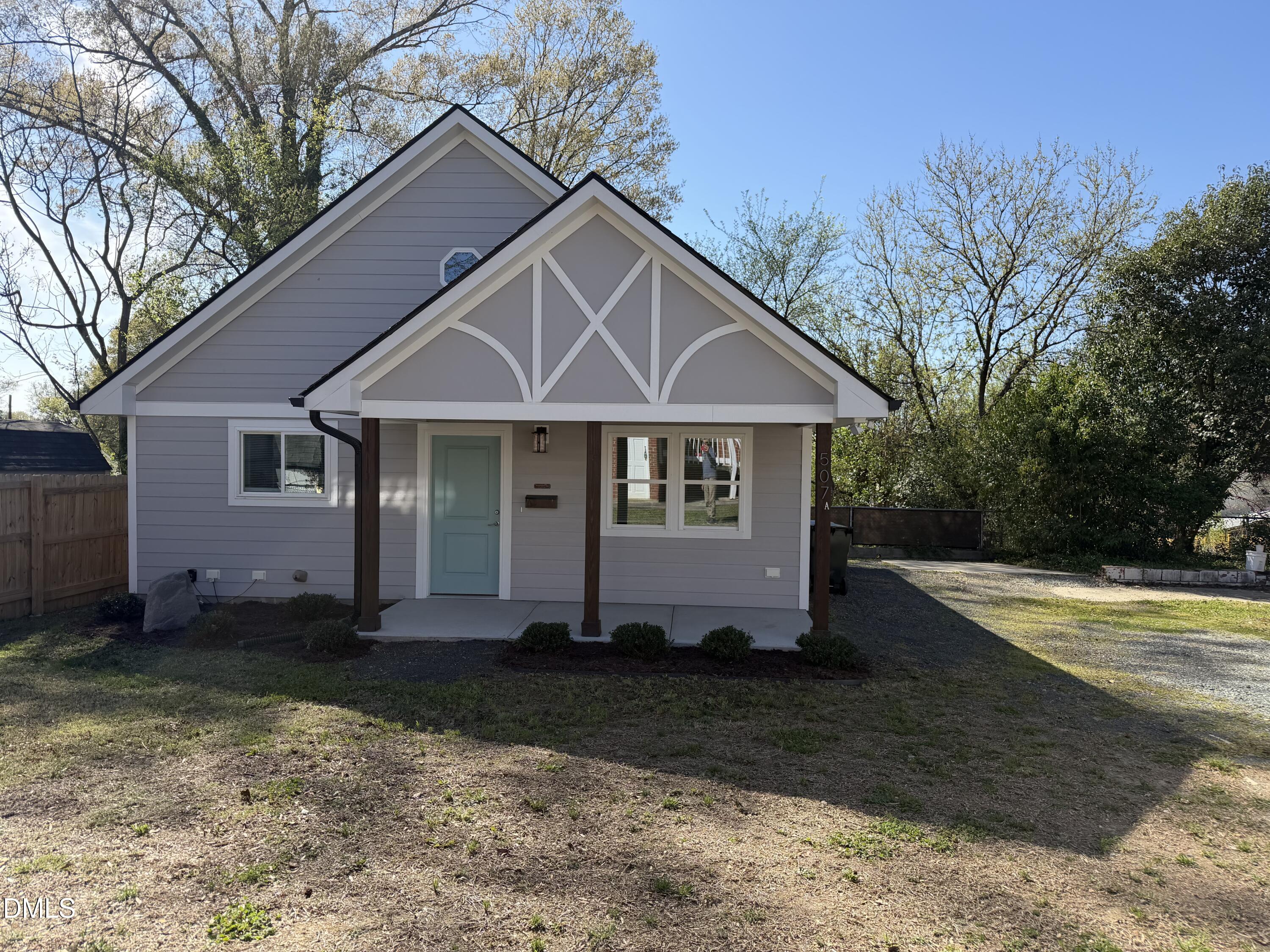 507 North Maple Street, Unit A Durham, NC 27703 - Photo 15 of 15 a front view of a house with a yard