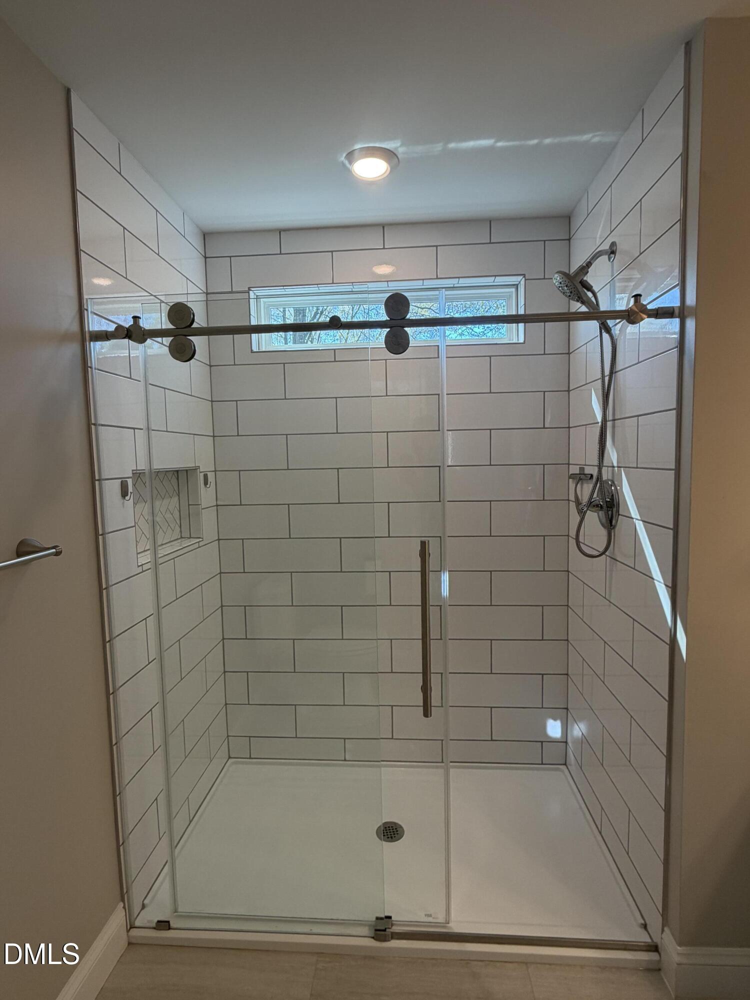 507 North Maple Street, Unit A Durham, NC 27703 - Photo 10 of 15 a bathroom with a shower