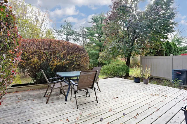 a wooden bench sitting on top of a wooden floor