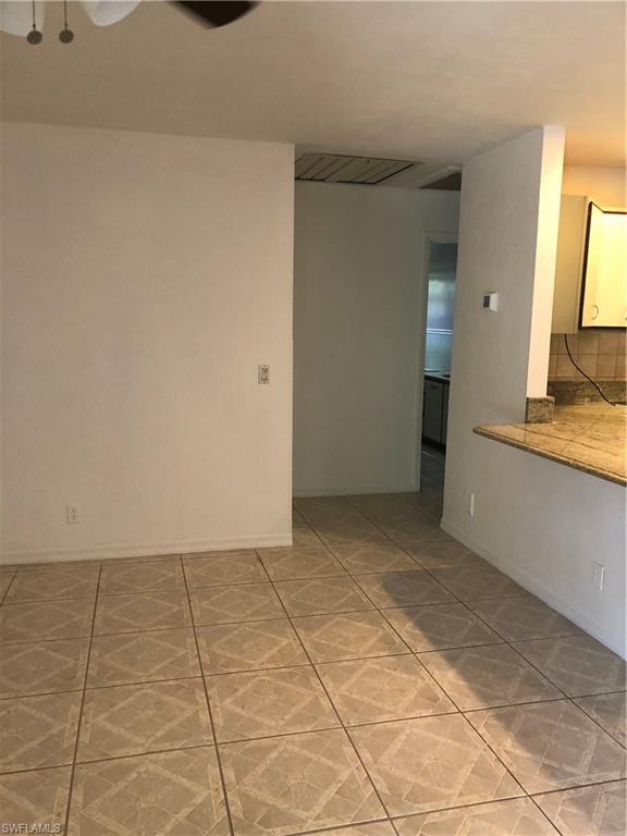 171 3rd Street Southwest Naples, FL 34117 - Photo 18 of 24 DINING ROOM FRESHLY PAINTED