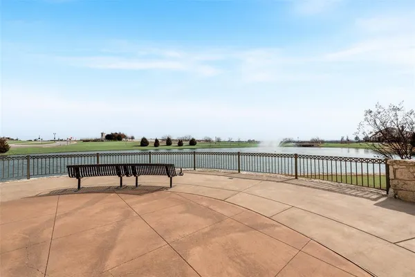 a view of a terrace with chairs
