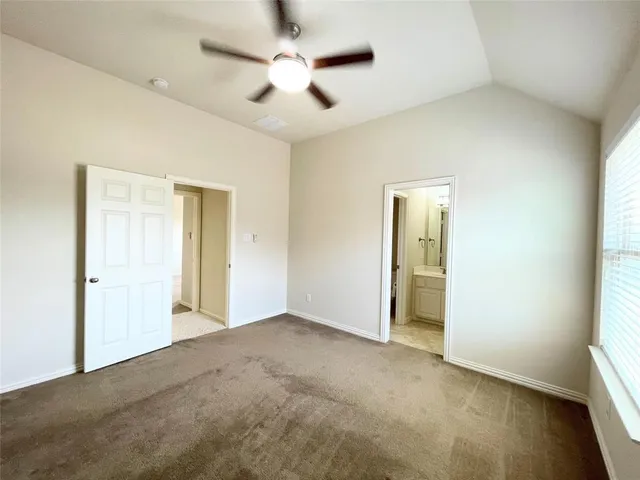 a bathroom with a tub and shower