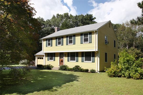 85 Oxbow Road Wayland, MA 01778 - Photo 1 of 8 a front view of a house with a yard