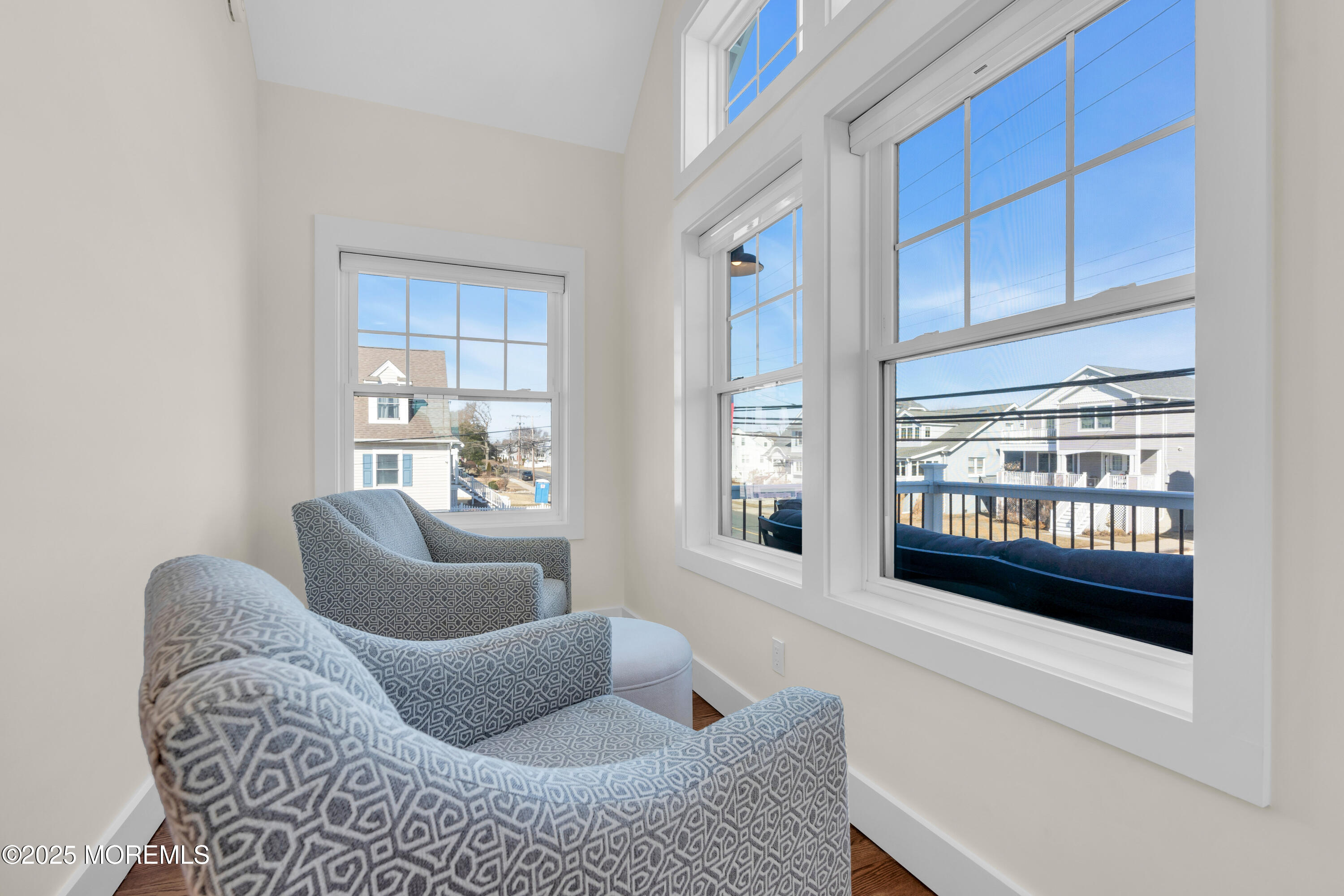 455 East Main Street Manasquan, NJ 08736 - Photo 11 of 47 a living room with furniture and a floor to ceiling window